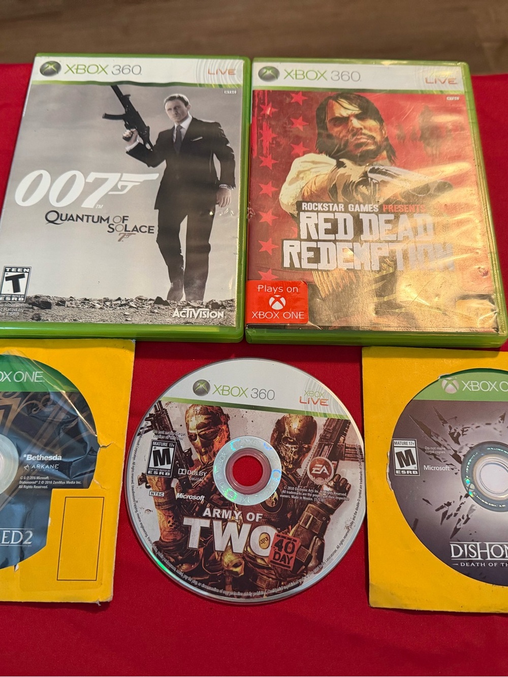 Microsoft Xbox 360 Game Lot with Green Cases and Red Highlights